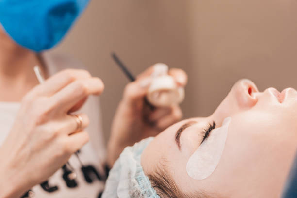 istock Cosmetic procedure for the extension of artificial eyelashes 1603703000