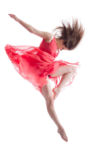 The dancer in midair isolated on white Dancer in red dress isolated on white ballet dancer feet stock pictures, royalty-free photos & images