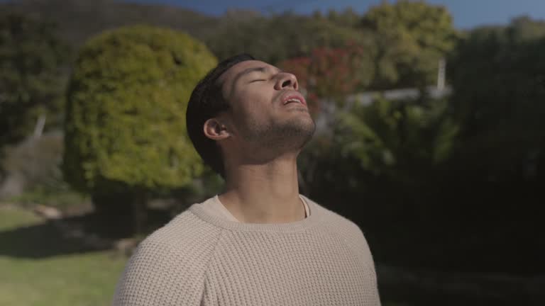 Capturing a Handsome Man's Serene Inhalation in the Garden