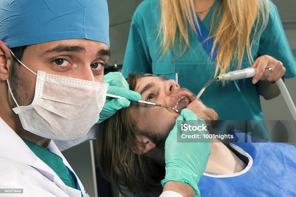 Zahnarzt und seinen Patienten - Lizenzfrei Attraktive Frau Stock-Foto