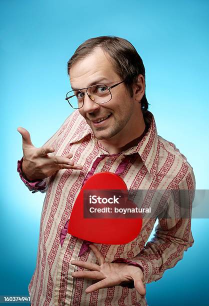 Cheesy Nerd With Large Red Heart Stock Photo - Download Image Now - Kitsch, Valentine's Day - Holiday, Adult