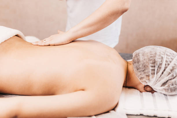 istock Professional massage therapist skillfully treats 1603760922