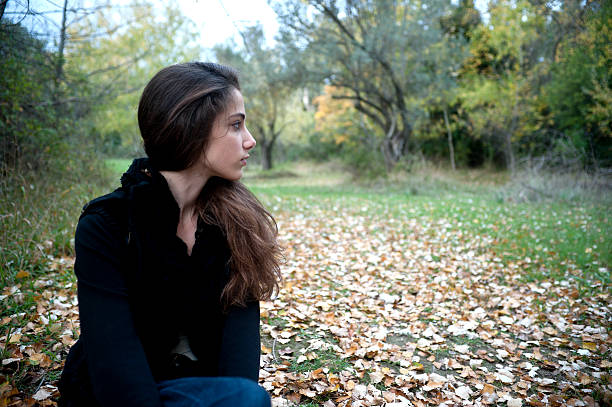 girl lying on the grass