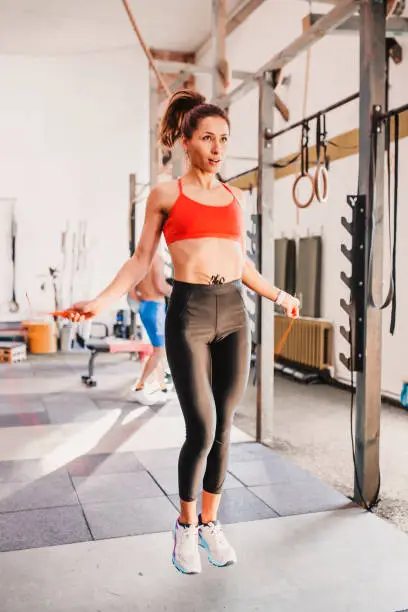 Jumping rope - endurance training - slim athletic girl workout