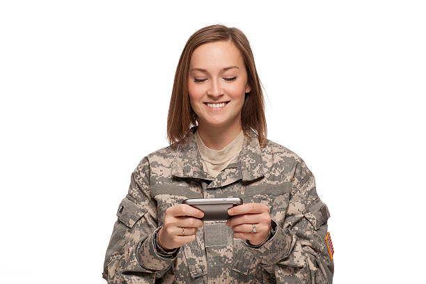 istock Female Soldier reading text messages 160380526