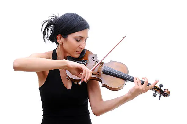 Photo of Violinist in black tee playing her violin with eyes closed