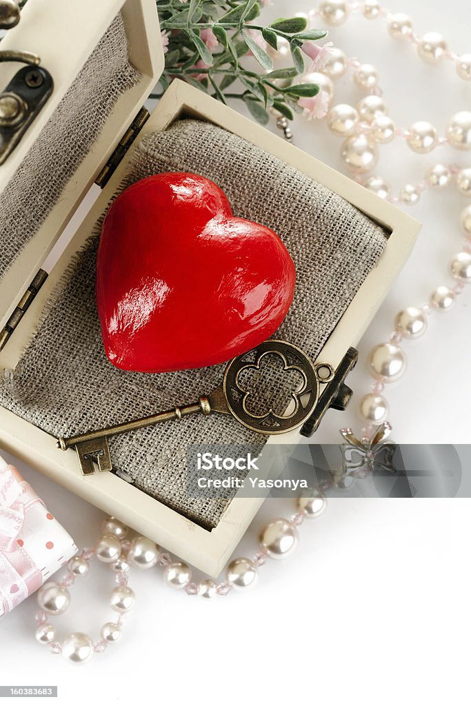 red heart with key in box red heart with key in box isolated on white background Box - Container Stock Photo