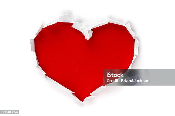 En Forma De Corazón A Través Del Orificio En Papel Foto de stock y más banco de imágenes de Símbolo en forma de corazón - Símbolo en forma de corazón, Papel, Rasgado