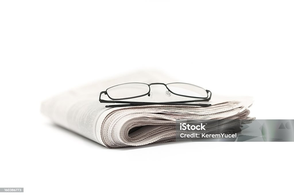 眼鏡に折り返しの新聞 - 新聞のロイヤリティフリーストックフォト
