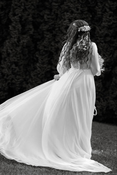 istock red-haired girl bride with a wedding bouquet 1603883480