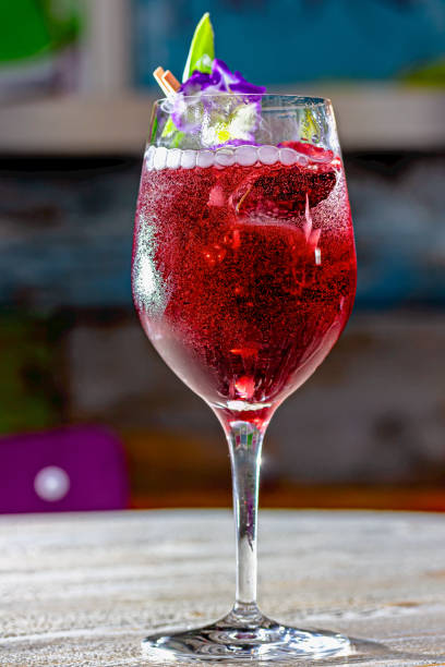 istock red cocktail with sparkling wine aperol whiskey juice bar 1603917642