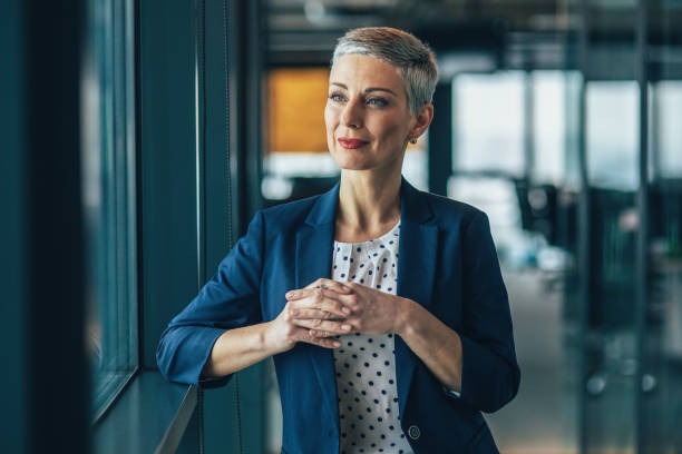 istock Confident businesswoman in modern office 1603968293