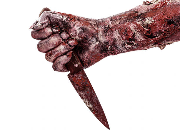 istock undead hand attacking with knife, assassin, bloody monster, isolated white background. 1603985133