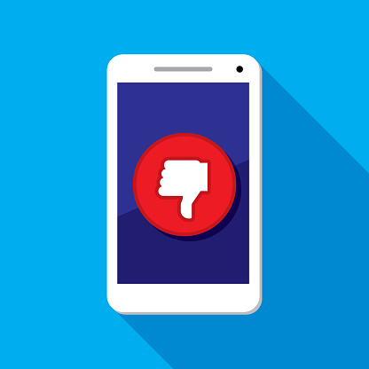 Vector illustration of a smartphone with thumbs down icon against a blue background in flat style.