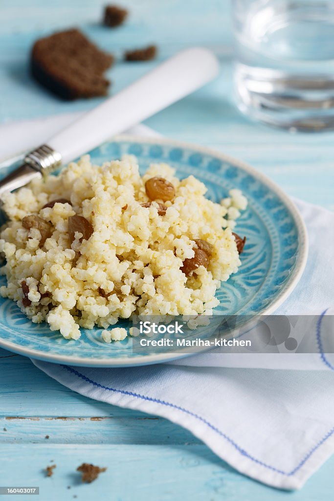 Millet porrige with raisins Blue Stock Photo