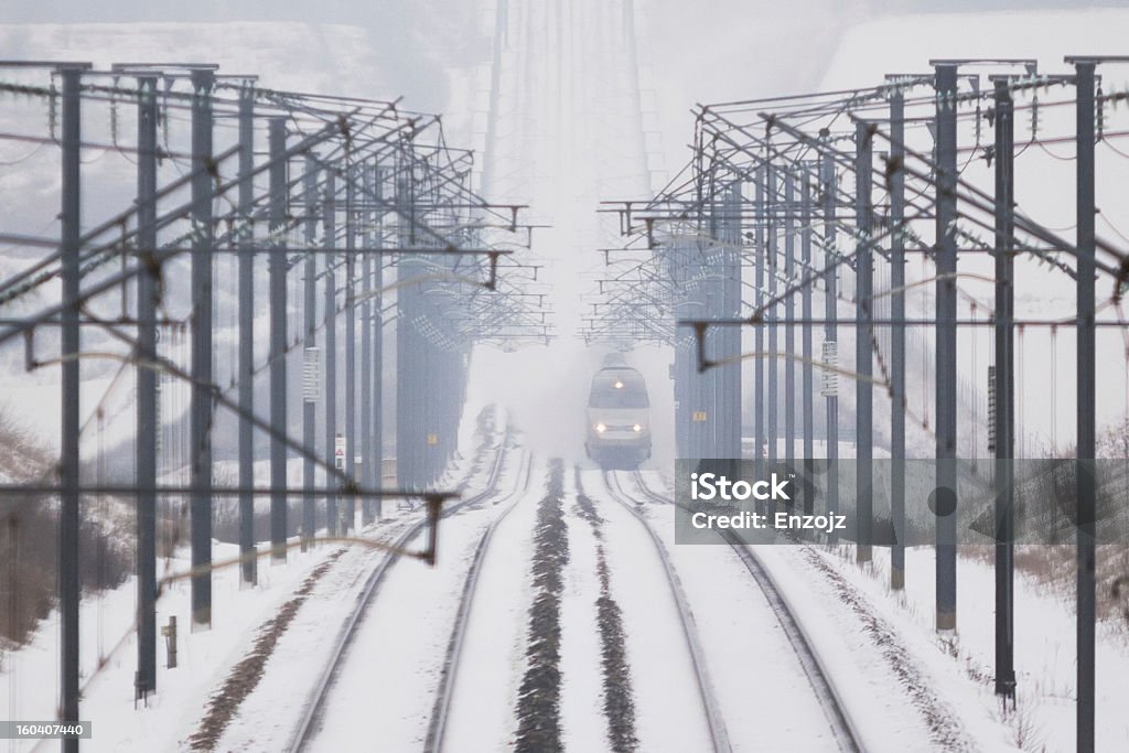 Train in snow High speed train running forwards me in the snow TGV Stock Photo