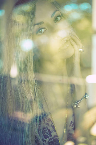 istock Beautiful lady through the glass 160411764