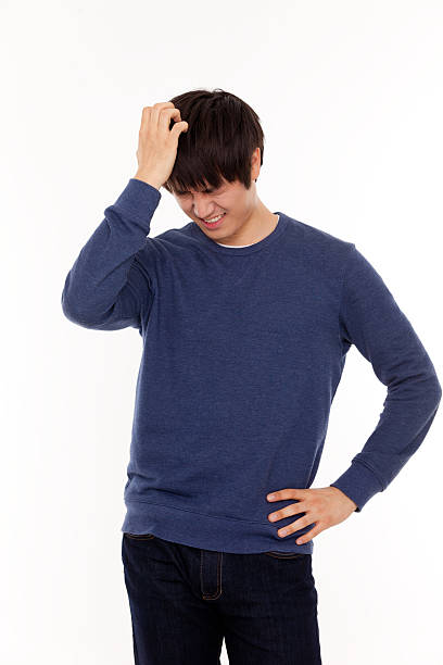 Asian young man having a stress