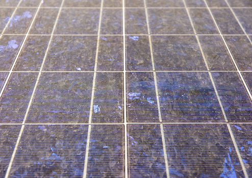 Dust-covered surface of a solar panel.