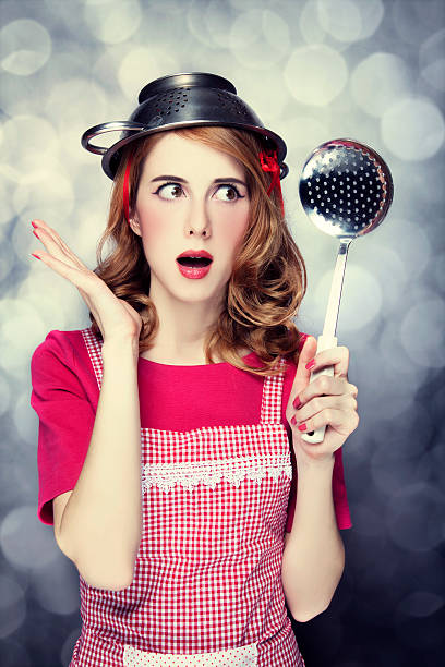 istock Redhead housewife with soup ladle 160416013