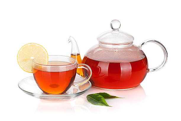 istock Glass teapot and cup of black tea with lemon slice 160416751