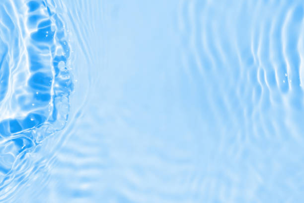 istock Abstract transparent water shadow surface texture natural ripple on blue background 1604176518