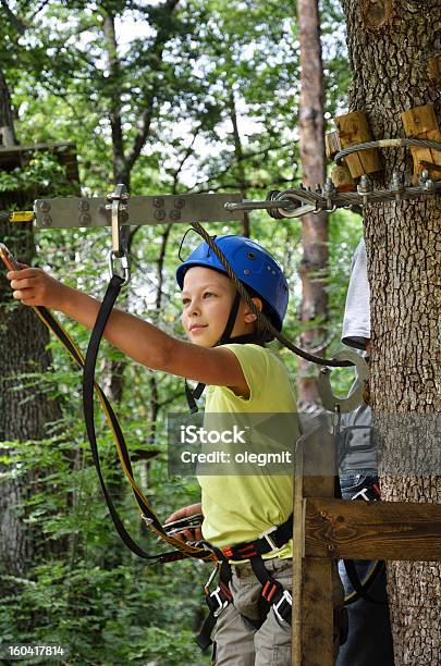Preteen Girl At The Rope Course Stock Photo - Download Image Now - Child, Ropes Course, Activity