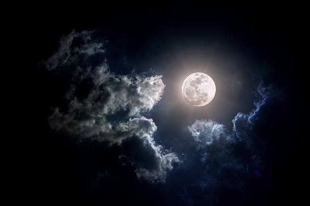 Moon on Cloudy day stock photo