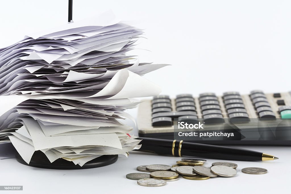 Bills on desk Bills in paper nail on business desk Receipt Stock Photo