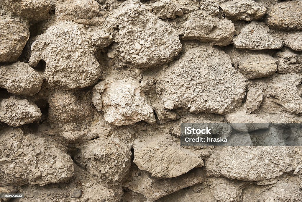 Konglomerat stone wall - Lizenzfrei Alt Stock-Foto