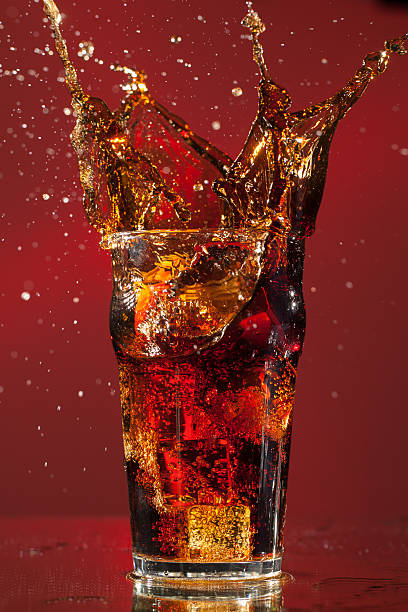 istock Pint of Cola with ice cube splash 160424251