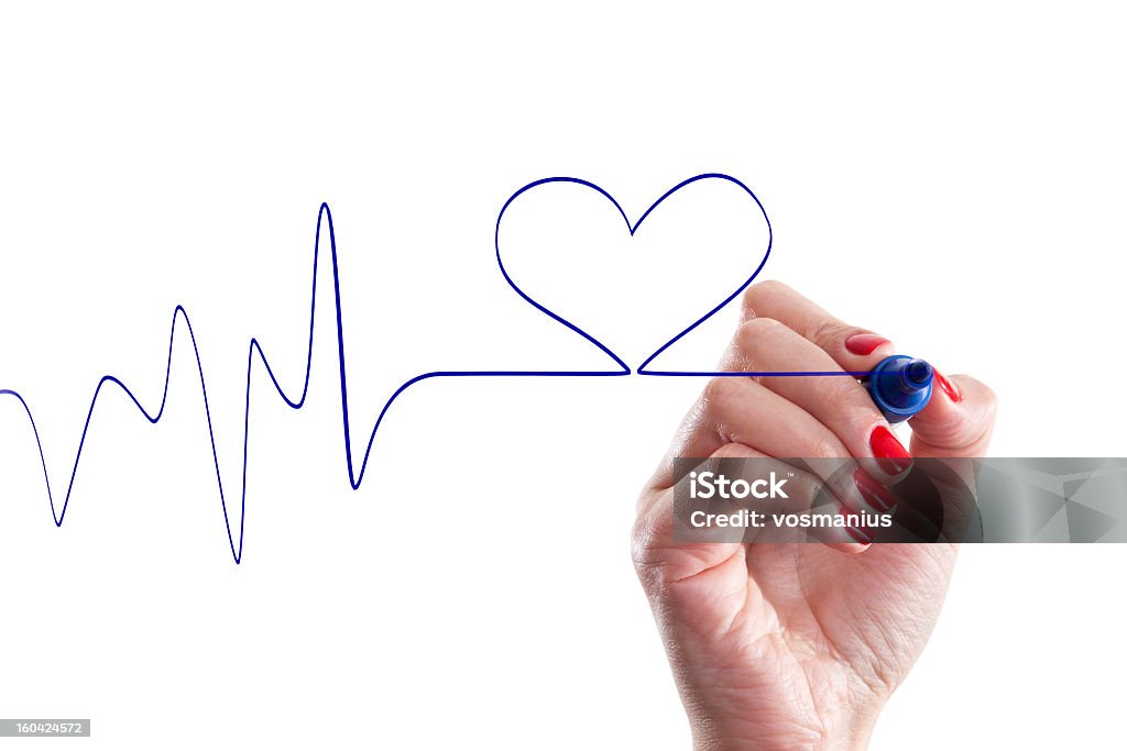 Hand with blue marker drawing heart shape Analyzing Stock Photo