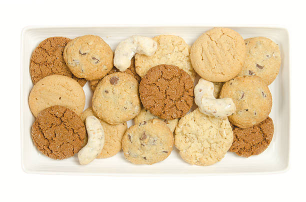 istock Plate of home made cookies isolated on white 160424921