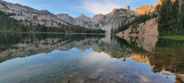 istock A Serene Mountain Landscape with Tranquil Reflections 1604287051