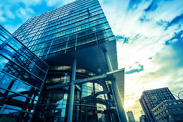 istock Modern glass office building at sunrise 160429564