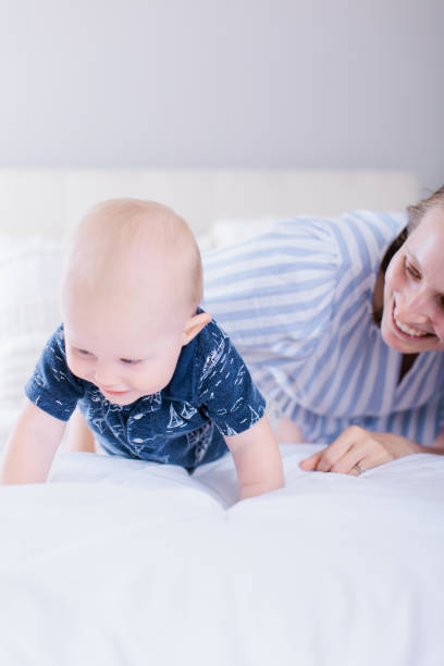 istock Mom with 1 year old baby boy 1604305167