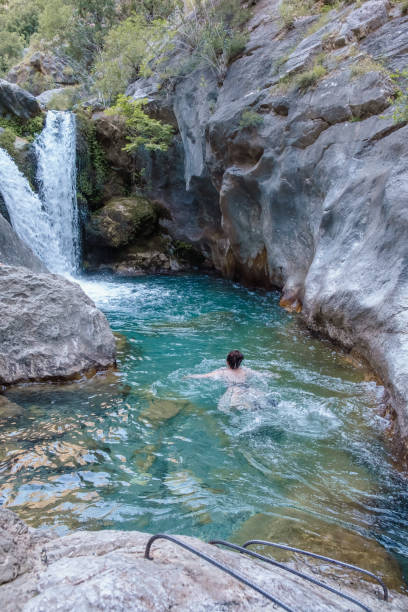 istock A beautiful mountain gorge with a river and a waterfall 1604321429