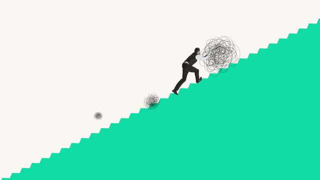 Creative artwork. Businessman, employee pushing forward big tangled ball symboliing fearless overcoming problems. Stop motion.