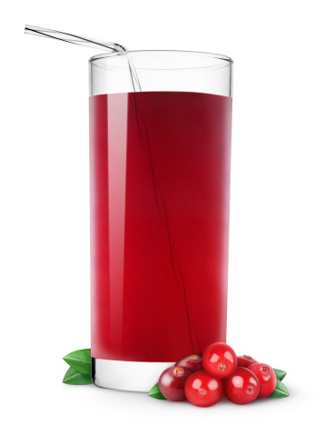 Glass of cranberry juice isolated on white.