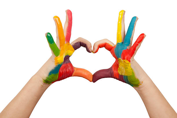 istock Hands forming a heart shape painted in multiple colors 160434911