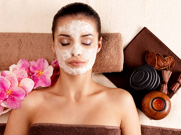 istock woman relaxing with cosmetic mask on face 160438831