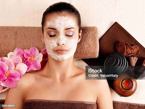 Woman Relaxing With Cosmetic Mask On Face Stock Photo - Download Image Now - Adult, Alternative Therapy, Applying