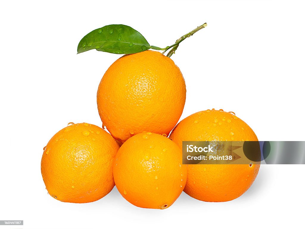 Cuatro apilado naranjas - Foto de stock de Agua libre de derechos