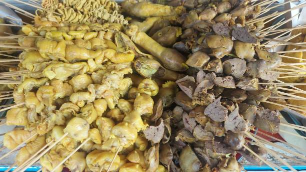 istock Chicken brutu or chicken butt and chicken liver satay 1604435215