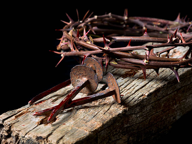 Christ. Easter holy week Simulation of the nails of Jesus Christ and the crown of thorns rusty barb stock pictures, royalty-free photos & images