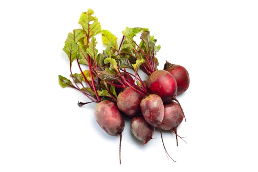 Pile of beetroots isolated on a white background.