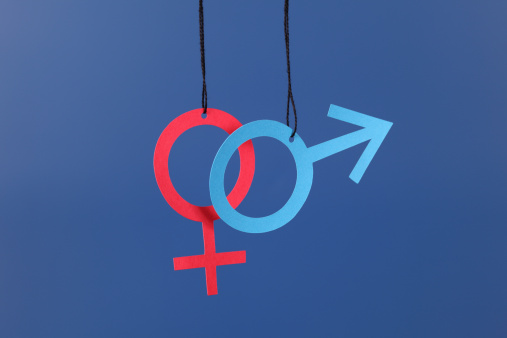 Paper Gender Symbols. Blue Background.