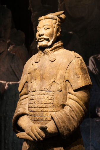 XIAN, CHINA - October 8, 2017: Famous Terracotta Army in Xi'an, China. The mausoleum of Qin Shi Huang, the first Emperor of China contains collection of terracotta sculptures of armored men and horses.