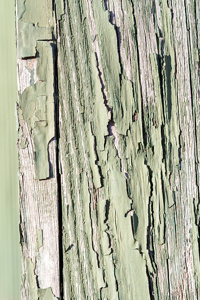 Peeling cracking Green paint stock photo