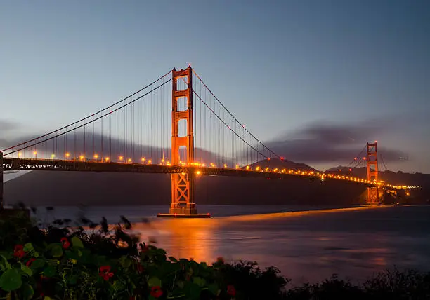 Photo of Golden Gate Bridge in San Francisco California illuminated at night